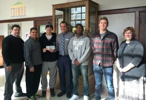 group of students receiving basketball tickets
